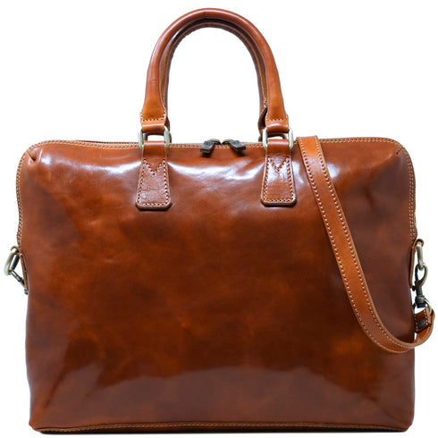 The Floto Milano Slim leather briefcase is a men's  bag that is handcrafted in Italy.  This is the Milano Slim  in Olive Honey Brown.